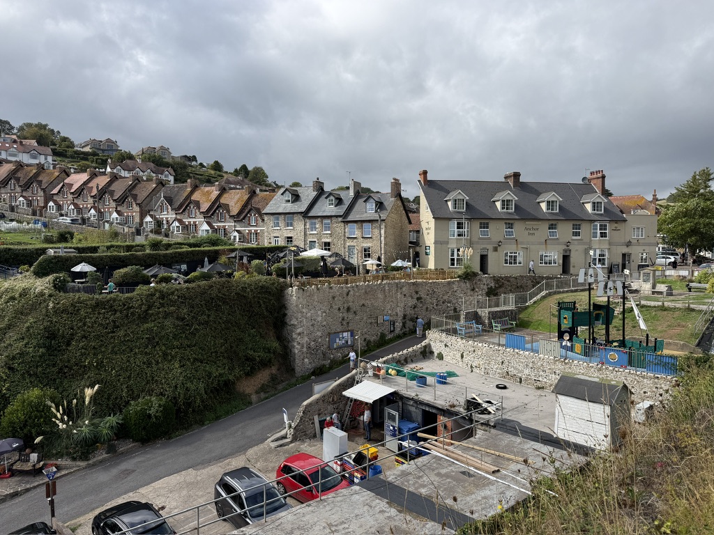 View across Beer, Devon, showing the Anchor Inn, traditional hillside cottages and the lane leading down to Beer Beach.