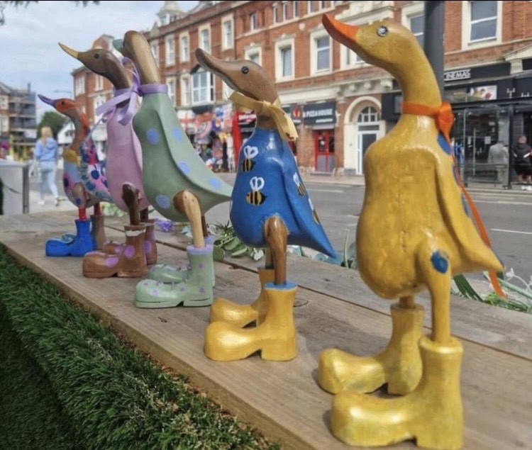 Arty Boat’s distinctive hand-painted wooden ducks (Credit: ArtyBoat) Colourfully painted wooden ducks displayed by Arty Boat. Things to do in Exmouth even when its raining.