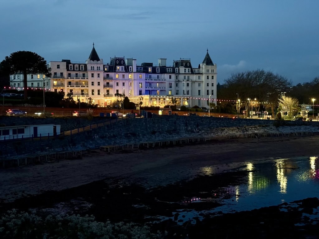 Torquay seafront illuminated at dusk during the Bay of Lights Christmas celebrations.