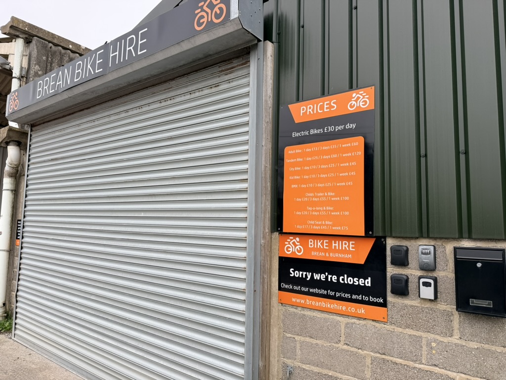 Brean Bike Hire shop and bicycle hire price board near Diamond Farm in Brean.