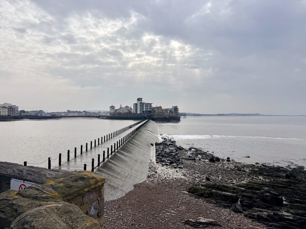 Causeway leading to Knightstone Island in Weston-super-Mare with Marine Lake and the Bristol Channel along the Somerset coast.