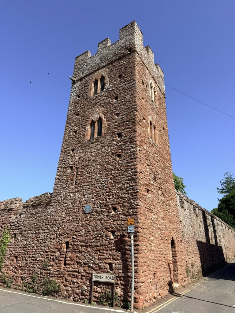 Coverdale Tower in Paignton, a medieval red sandstone tower beside St John the Baptist Church in Old Paignton, Devon.