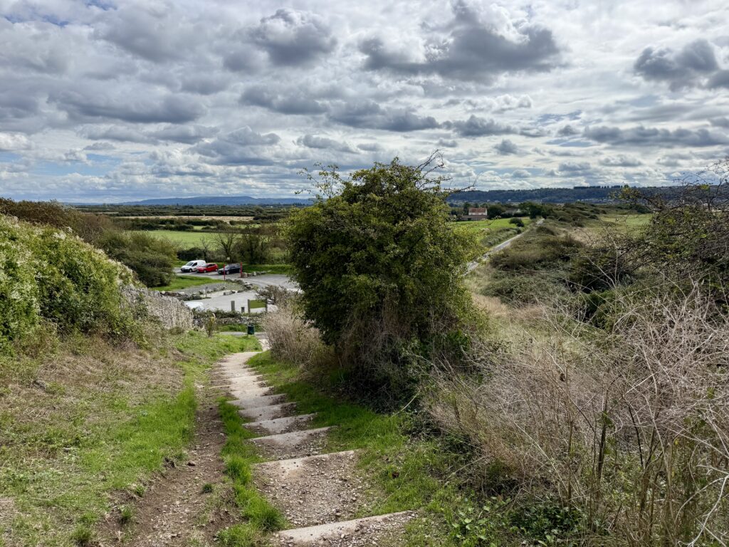 Steps down to the National Trust Sand Point car park and Beach Road near Sand Bay