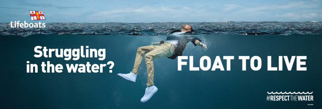 RNLI Float to Live safety graphic showing a person floating on their back in the sea.